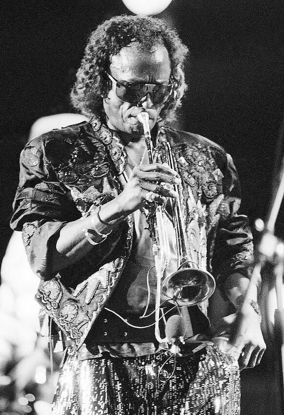 Miles Davis, shown here in a 1987 performance, was frequently the subject of Bob Willoughby's photography. A display of Willoughby's work will be on display at the Chandler Museum from April 6 to May 26.