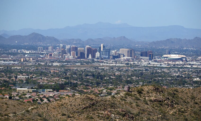 The downtown Phoenix skyline is easier to see, Tuesday, April 7, 2020, as fewer motorists in Arizona are driving, following the state stay-at-home order due to the coronavirus. A new EPA rule is seeking to lower emissions of tiny particles that could keep the Valley's air cleaner, but local business and Republican leaders object to the plan. (AP Photo/Ross D. Franklin)