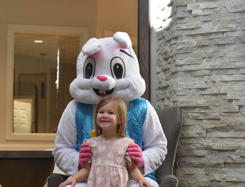 Little Falcons Preschool student Reagan Knox dressed in a bunny dress for her Easter visit to Fountain View Village. (Independent Newsmedia/George Zeliff)