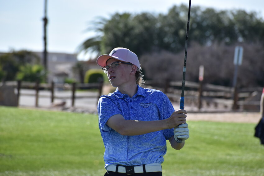 Senior Jaxson Butcher watches his ball after teeing off. (Independent Newsmedia/George Zeliff)