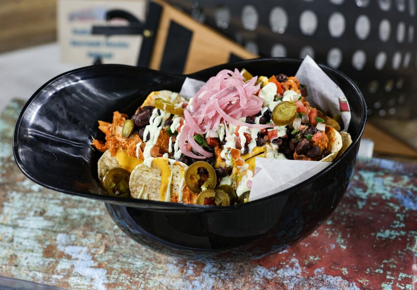 The Chicken Tinga Souvenir Nacho Helmet is another ballpark take on a classic, this time a Mexican dish normally made with tomato, chipotle chilis in adobo, and onion. (Photo by Ethan Briggs/Cronkite News)
