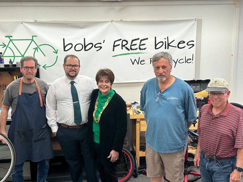 From left, Brian Martin, Tony Pellegrini, Susan Pellegrini, Mark Jordan and Dave McGill at Bob&rsquo;s Free Bikes in Fountain Hills.