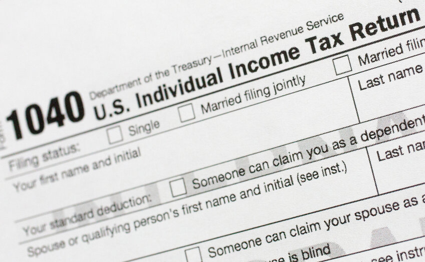 Part of a 1040 U.S. Individual Income Tax Return form is shown July 24, 2018, in New York. U.S. District Judge Murray Snow said during a Tuesday hearing he was not even convinced Arizona has a right to sue over an Internal Revenue Service determination that found tax rebates about 750,000 Arizona families received last year are taxable. (Associated Press/Mark Lennihan)