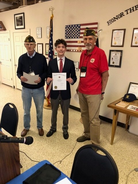 The VFW Post 7507 recognized Notre Dame Prep High School student Alexander Coppo for his first place Voice of Democracy essay. Members presented Coppo with a Certificate of Recognition and a gift card from the post. Coppo also received a medal and pin for his first place entry at the VFW District level. Coppo read his entry to the post members assembled. From left, senior vice commander and Post Voice of Democracy chair Dick Holper, Alexander Coppo and Post Commander Bill Luzinski.