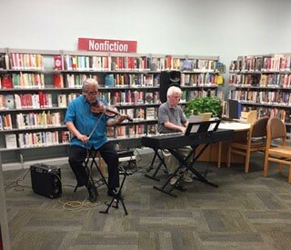 A band plays at Bell Public Library in August 2019 as part of the 10th anniversary celebration of joining the Maricopa County Library District.