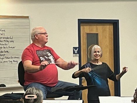 Pictured from left is Fountain Hills Community Band Music Director Scott Burgener and guest conductor Sandi Thompson who won the drawing last year to conduct a song at the band&rsquo;s Christmas concert in December.