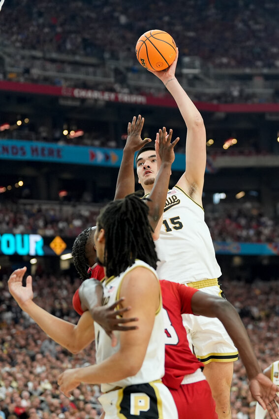 Purdue center Zach Edey (15) shoots against North Carolina State during the first half of the NCAA college basketball game at the final four tournament, Saturday, April 6, 2024, in Glendale.