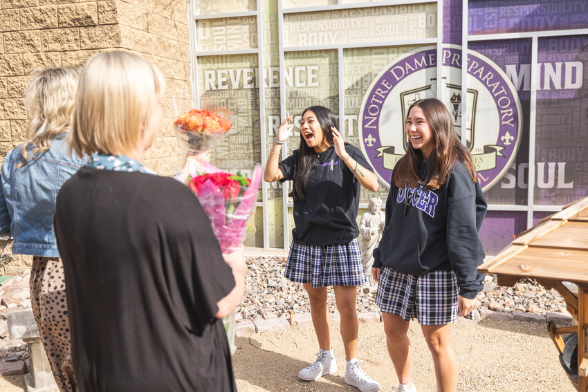 Seniors Lara Valasquez, left and Chloe Grindal show their surprise at the announcement that they earned the honors of valedictorian and salutatorian respectively for the Notre Dame Preparatory High School Class of 2024.