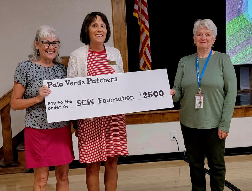 Checks were presented by club president Kathleen McCulloch, left, and treasurer Merrikay Vidal, right, to Teresa Brown, of the SCW Foundation, and, also pictured, to Arlene Peterson, Linda O&rsquo;Donnell and Bob Bass, of the Community Fund.