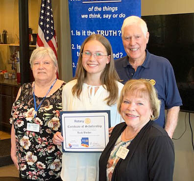 Leah Bucher, a senior at Peoria High School, was one of two students to receive a $2,000 scholarship from the Peoria North Rotary Club. From left, Club Secretary Margaret Fried, Leah Bucher, President Steve Matthews and PNRC Youth Chair Darlene Eger.