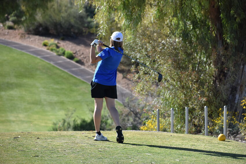 Freshman Savannah Simonson tees off at Desert Canyon Golf Club. (Independent Newsmedia/George Zeliff)