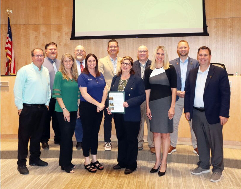 Ramona Simpson, center, the town&rsquo;s environmental and fleet operations manager earned her the Solid Waste Association of North America 2024 Communication, Education, and Marketing Technical Division Distinguished Individual Achievement Award. She was recognized during the Wednesday Queen Creek Town Council meeting.