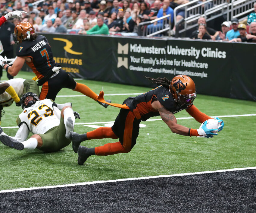 Arizona's Jamal Miles (2) stretches over the goal line on Sunday in the Rattlers' 55-45 loss to San Diego. (Arizona Rattlers/Matt Hinshaw)