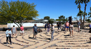 Walkers during the World Labyrinth Day Walk for Peace in 2023, at Labyrinths at the Palms, Sun City.