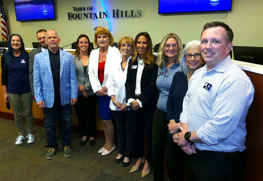 Representative from the University of Arzona are welcomed by Fountain Hills Town Council members April 16. Mike Mobley is at right, Tara Burke is third from right and Jane Surgent is fourth from right.