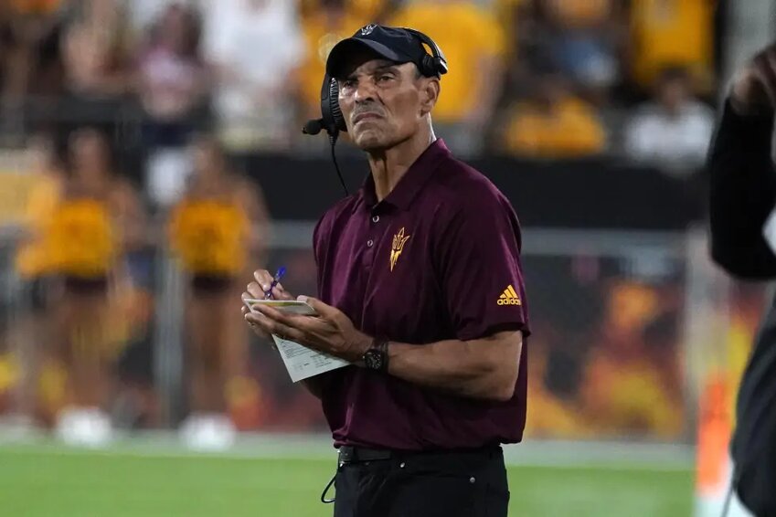 Agreed-upon NCAA violations include recruiting inducements, impermissible tryouts and tampering by the staff under former head coach Herm Edwards, pictured.