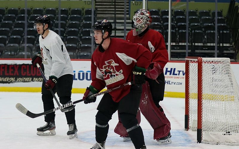 Tucson Roadrunners players on the ice during practice. Coyotes owner Alex Meruelo has been publicly sharing plans to move the minor league team to Tempe, but the Roadrunners and city of Tucson have not heard from Meruelo&rsquo;s team in the process. (Cronkite News/Rudy Aguado)