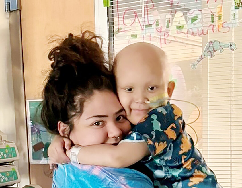 Destiny Martinez of Chandler holds her son, Ollie, in this recent photo. Ollie has a form of leukemia that requires an expensive search for a bone marrow donor match as well as a procedure.