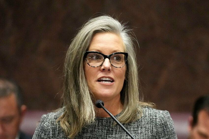 Arizona Gov. Katie Hobbs' &quot;headcount cap'' will allow agencies to replace employee losses but not to fill currently vacant posts, at least in most cases.