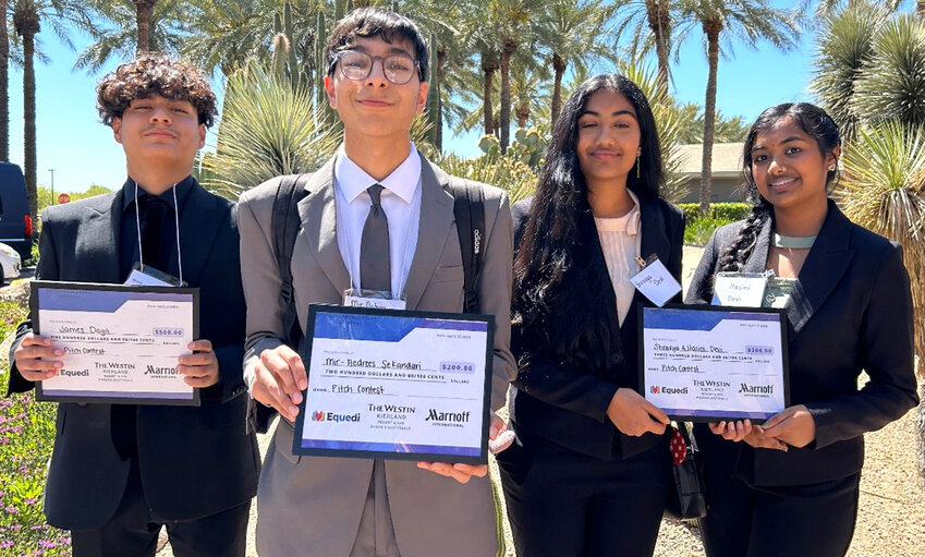 From left, James Daga, first place; Mir-Aedrees Sekandari, third place; and second place Hasini and Shravya Devi. All are from Mountain Ridge High School in Glendale.