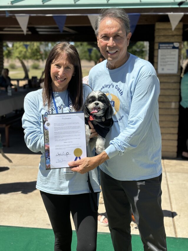 Scottsdale Mayor David Ortega shows support for Oakley&rsquo;s Oath at the first Pup-a-Palooza Spring Festival. Pictured, Oakley&rsquo;s Oath founder Julie Kessler, her dog Panda and Mayor Ortega. (Submitted photo/Lila Bartman)