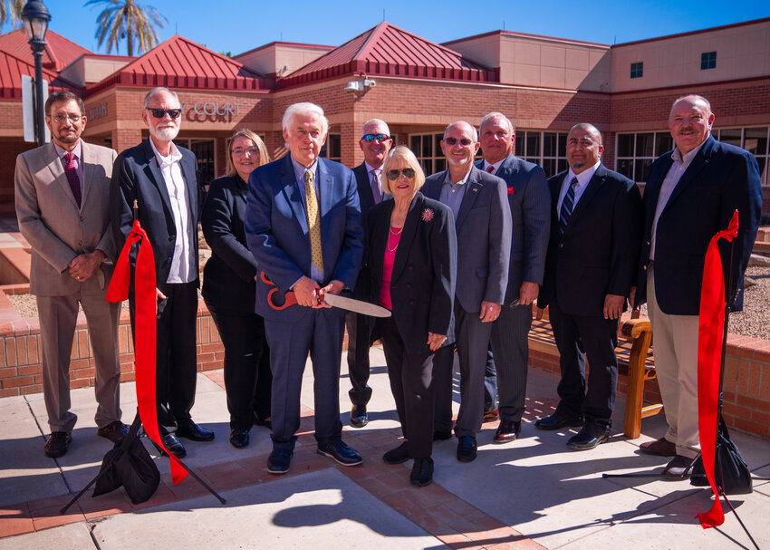 Glendale City Council members and city court employees pose after a ribbon cutting ceremony for the renovated Glendale City Court April 23.