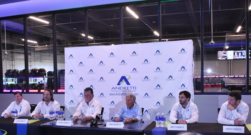 Six members of the Andretti family were on hand April 22 to take questions as part of a special event celebrating its new go-cart, arcade and restaurant location in Chandler. From the left are Jeff Andretti; Adam Andretti; Michael Andretti; Mario Andretti in the blue shirt, who is speaking; Jarett Andretti and Marco Andretti.