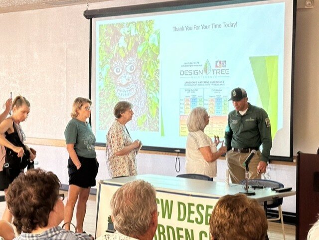 Ben McGonigle, certified arborist and owner of Design Tree Maintenance, stayed after the presentation to answer many questions.