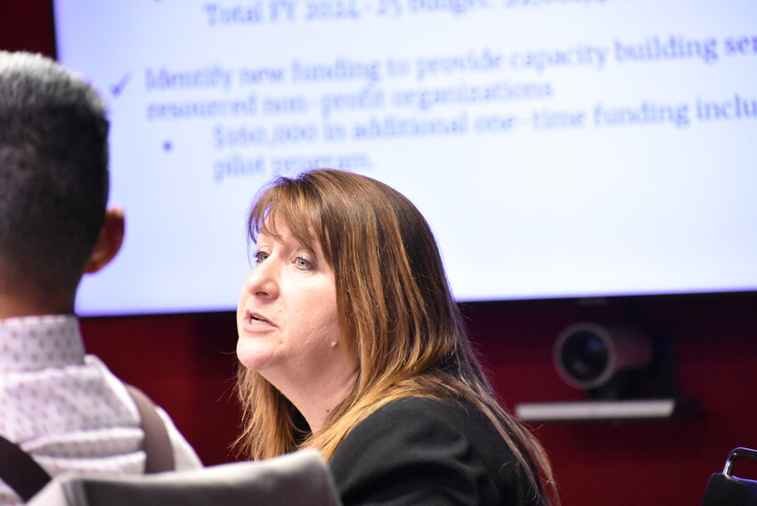 Leah Powell, neighborhood resources director for the city of Chandler, makes a presentation at an April work session with the City Council. The council and staff are working together to revise and provide extra funding to its annual Human Services nonprofit grant program.