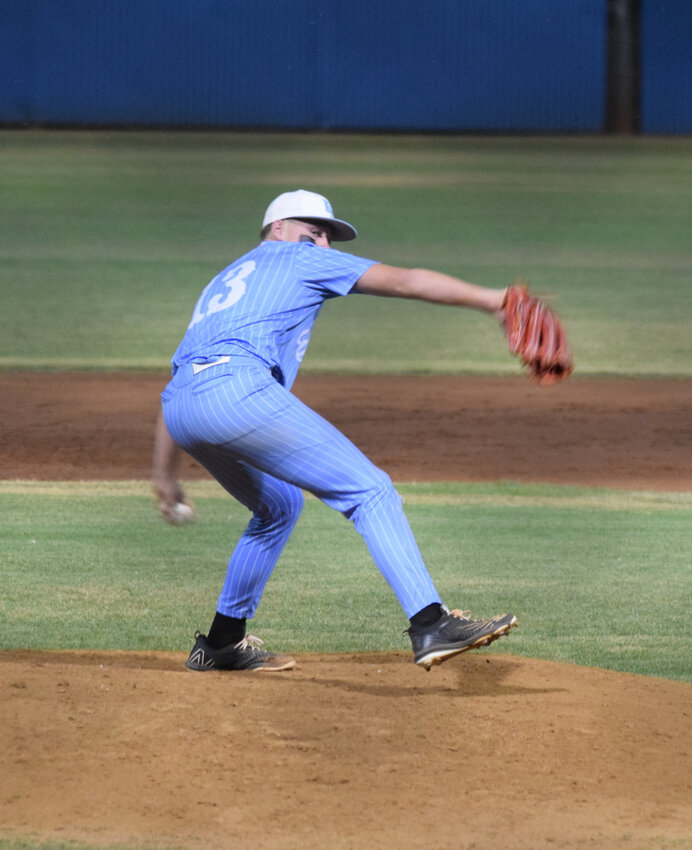Estrella Foothills junior pitcher Devin Kriley winds up to deliver a pitch during his 4A playoff winning start April 29.