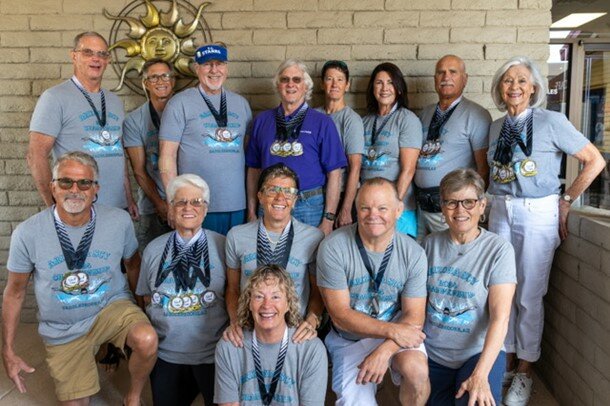 Winners from the Sun City Starrs at the Arizona State Championship Swim Meet include, top, from left, Earl Peters, Larry Vose, Rick Hanan, Dale Wiseley, Coach Leslie Nock, Cynthia Hayes, Bernie Sauve and Mindy Case; second row, Bill Shaw, Ann Case, Amy Vidos, Lee Hawkinson, Lonna Ramsey and, sitting, Carrie Curfman.