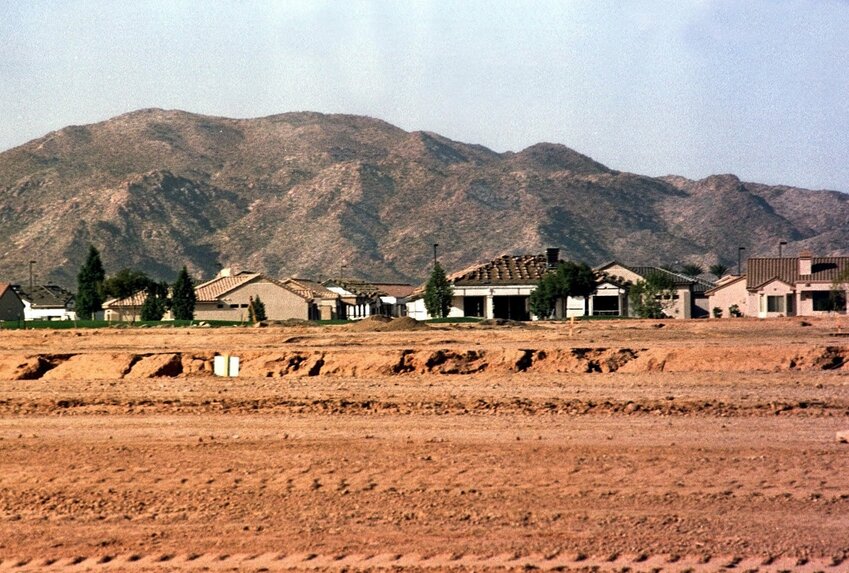 A development community backdrops a future development for new residents outside El Mirage. The Valley&rsquo;s homebuying scene remains buffered by interest rates, high prices and low demand.