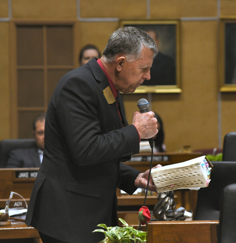 Sen. David Farnsworth, R-Mesa, quotes from the Bible Wednesday as he explains why he believes all abortions are wrong and why he voted against legislation to repeal a territorial-era law.