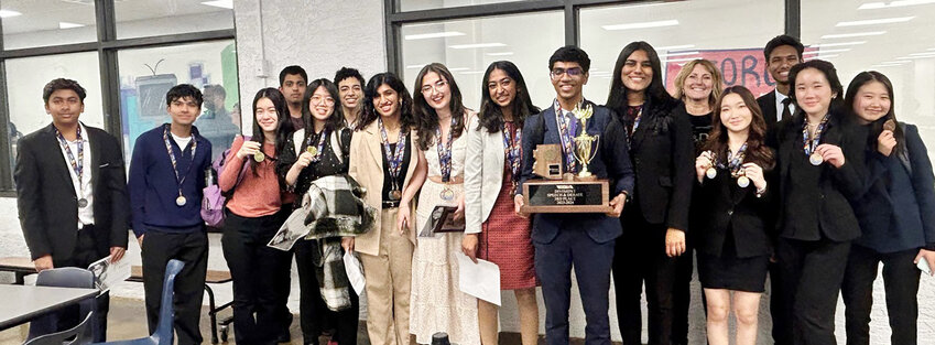 Members of Hamilton High School&rsquo;s debate team, shown here with the full squad as the team placed third in a recent state-level competition, earned a trip to this weekend&rsquo;s national competition in New York City.