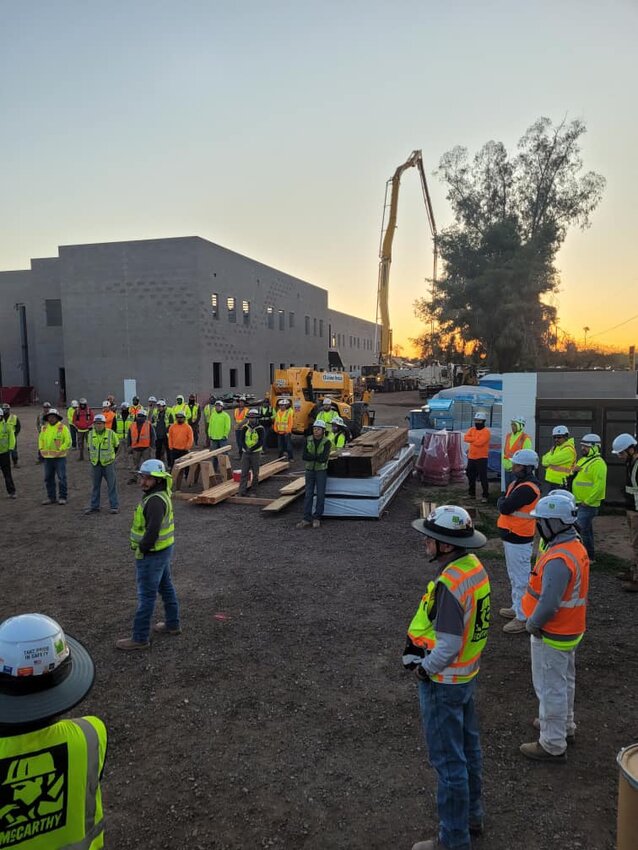 Workers gather at the start of a day on the site of the reconstruction of Galveston Elementary School. The Chandler Unified School District Governing Board is set to hear a presentation Wednesday on its bond options going into the November 2024 election cycle.