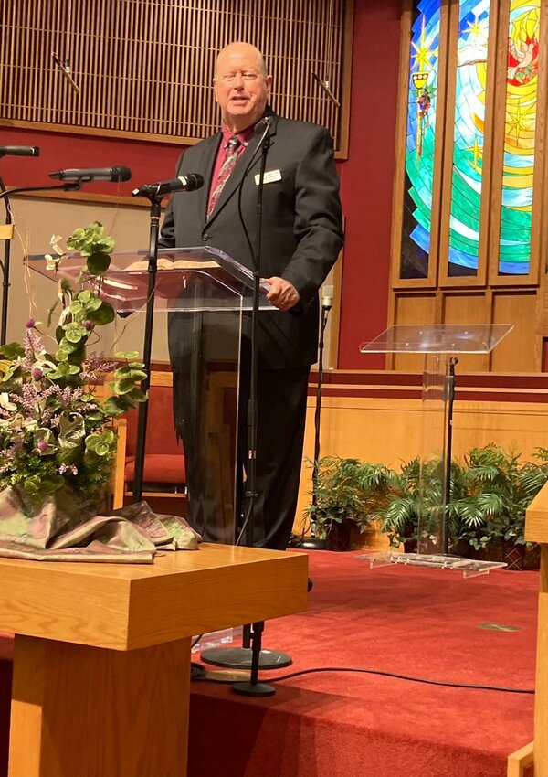 Dr. Kirby Kennedy, senior pastor of First Baptist Church, welcomes participants to the National Day of Prayer Service May 5.
