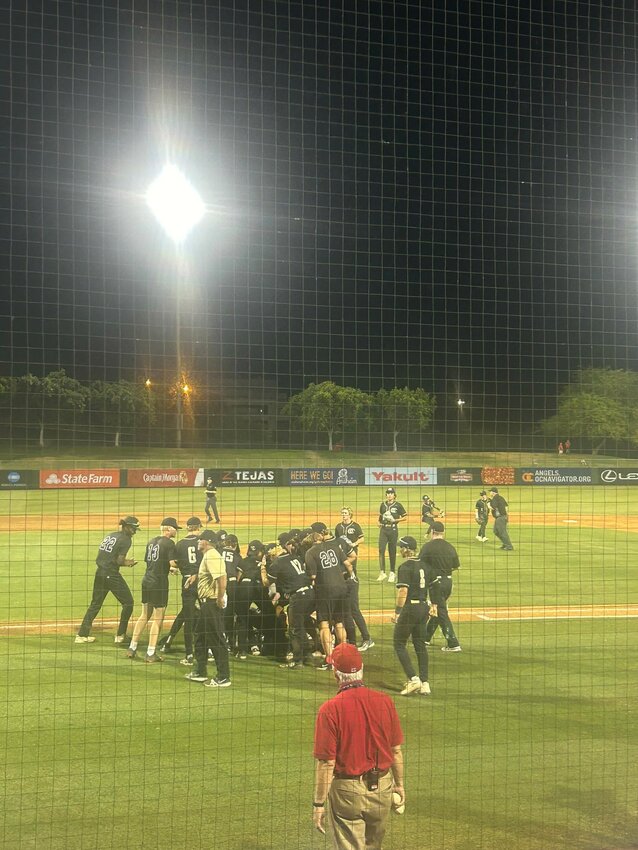 O'Connor baseball players dogpile after scoring two runs in the top of the seventh to upset #3 seed Liberty 2-1 in a 6A basbeall playoff elimination game May 7 at Tempe Diablo Stadium.