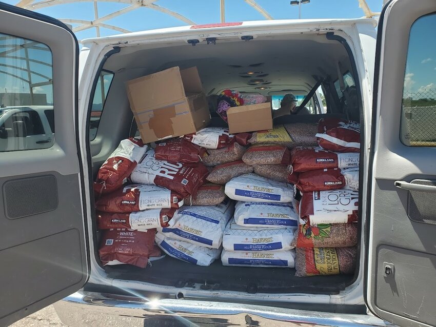 Essential supplies including rice, beans and flour arrive at the Nogales shelter, Casa de la Misericordia y de Todas las Naciones.