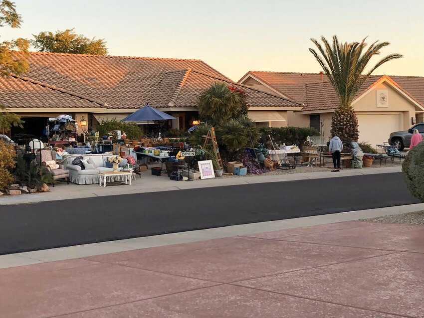 Some garage sales in Sun City West utilize the front yard of the property.