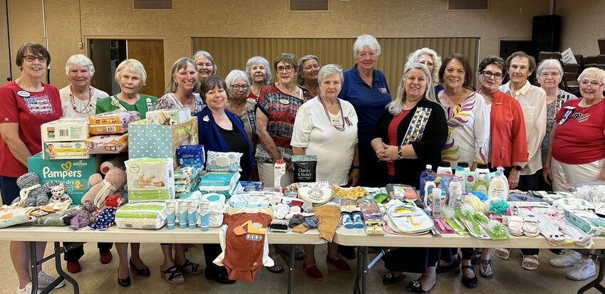 Members of Sun City&rsquo;s National Society Daughters of the American Revolution, Agua Fria Chapter, with the baby items and supplies recently donated.