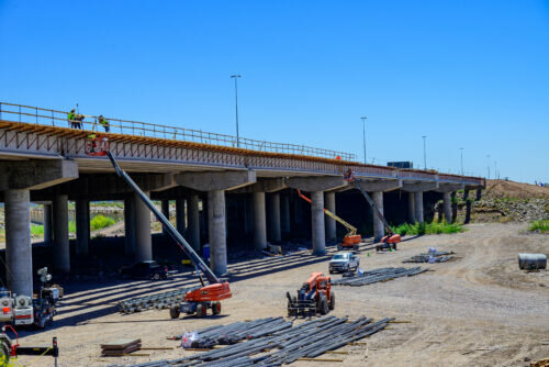With the bridge deck poured for the widening of westbound I-10 over the Salt River, crews this month began to build the deck for wider eastbound lanes as part of the Broadway Curve improvement project.