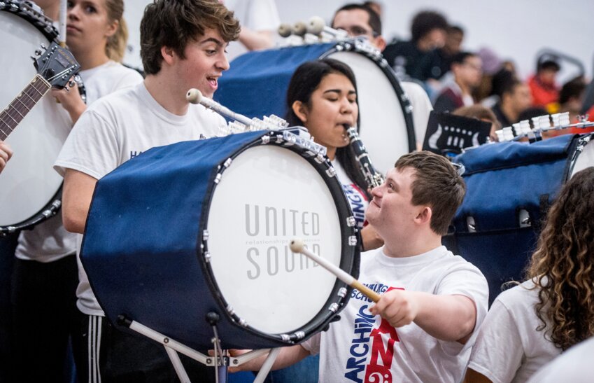 United Sound student playing the drums during a performance.
