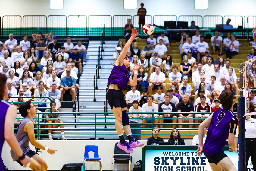 Northwest Christian senior Jack Hubbard hits for a kill attempt against Arizona College Prep during the 4A boys volleyball final May 11 at Skyline High School in Mesa. Hubbard led all players with 26 kills in the Crusaders' narrow loss.