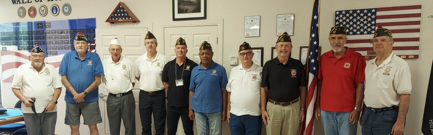 New VFW 7507 officers pictured are from left, Carl Krawczyk (Trustee), Richard Taylor (Trustee), Steve Messel (Trustee), Patrick Garman (Surgeon and JAG), Brian Minzie (Chaplain), Mike Cuthbertson (Jr. Vice Commander), Sandy Borken (Sr.  Vice Commander), Don Hervey (Commander), Bill Luzinski (Immediate Past Commander) and Boe James (Adjutant and Installing Officer). Not pictured are Jenni Smith (Quartermaster) and Matt Harman (Service Officer).