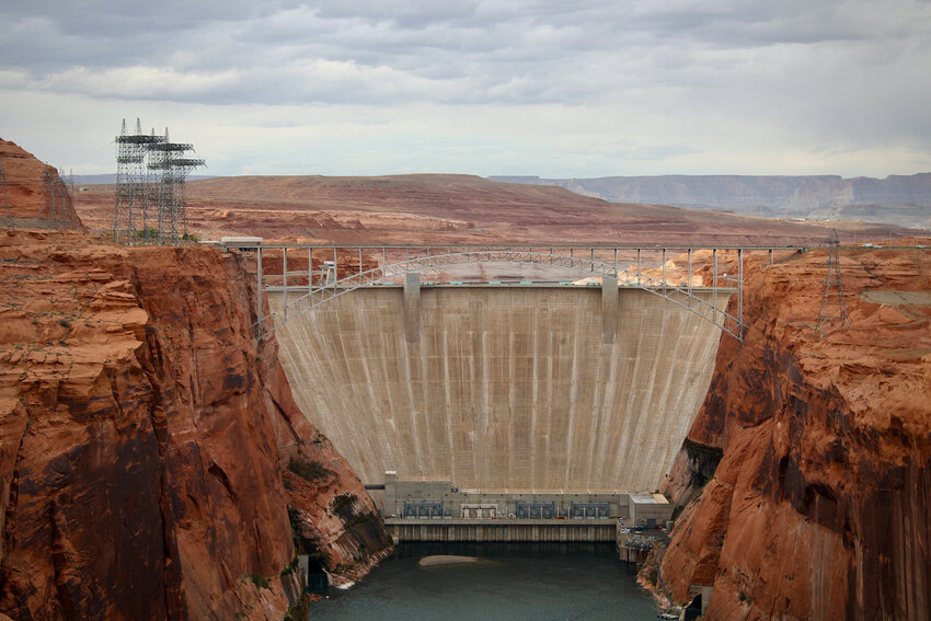 The Glen Canyon Dam holds back Lake Powell. As the lake&rsquo;s level has fallen to historic lows, some worry that wear on infrastructure inside the dam that was designed to cope with high water levels in the lake, could impede flow of the Colorado River. (Photo by Alex Hager/KUNC)