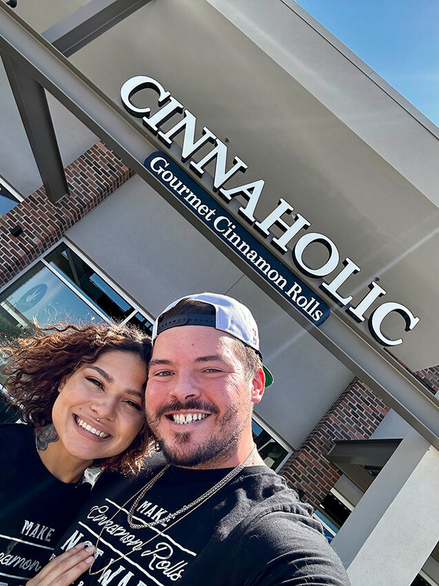 From left to right, Matthew K. Hodl and Telor Cansler of Hodl Rolls LLC wil be operating the new Cinnaholic Gourmet Bakery outlet opening in Queen Creek on Friday.