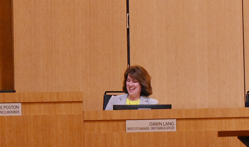 Chandler Chief Financial Officer Dawn Lang smiles during a lighter moment before her budget presentation during the Chandler City Council&rsquo;s May 23 meeting. The council approved a $1.629 budget that is 6% lower budget for Fiscal 2025 than the $1.66 billion it has for this year, with a one-penny-reduced property tax levy.