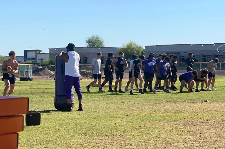 Valley Vista football players line up or do drills with coaches during the program's first OG's vs Young Bucks tournament May 17, marking the end of spring ball. John Morgando is the Monsoon's new coach.