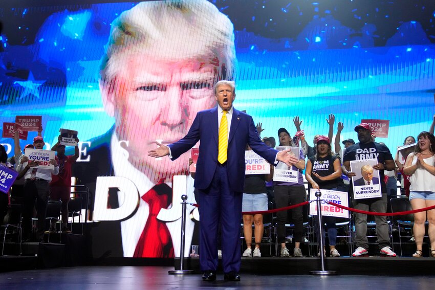 Republican presidential candidate, former President Donald Trump speaks at a campaign rally, Thursday, June 6, 2024, in Phoenix. (AP Photo/Rick Scuteri)