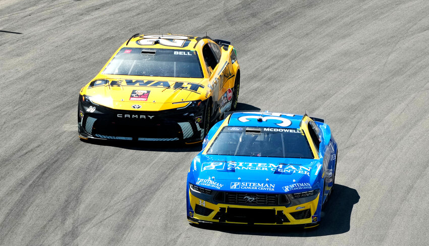 Michael McDowell (34) and Christopher Bell (20) face off during a NASCAR race at World Wide Technology Raceway Sunday, June 2, in Madison, Illinois.
